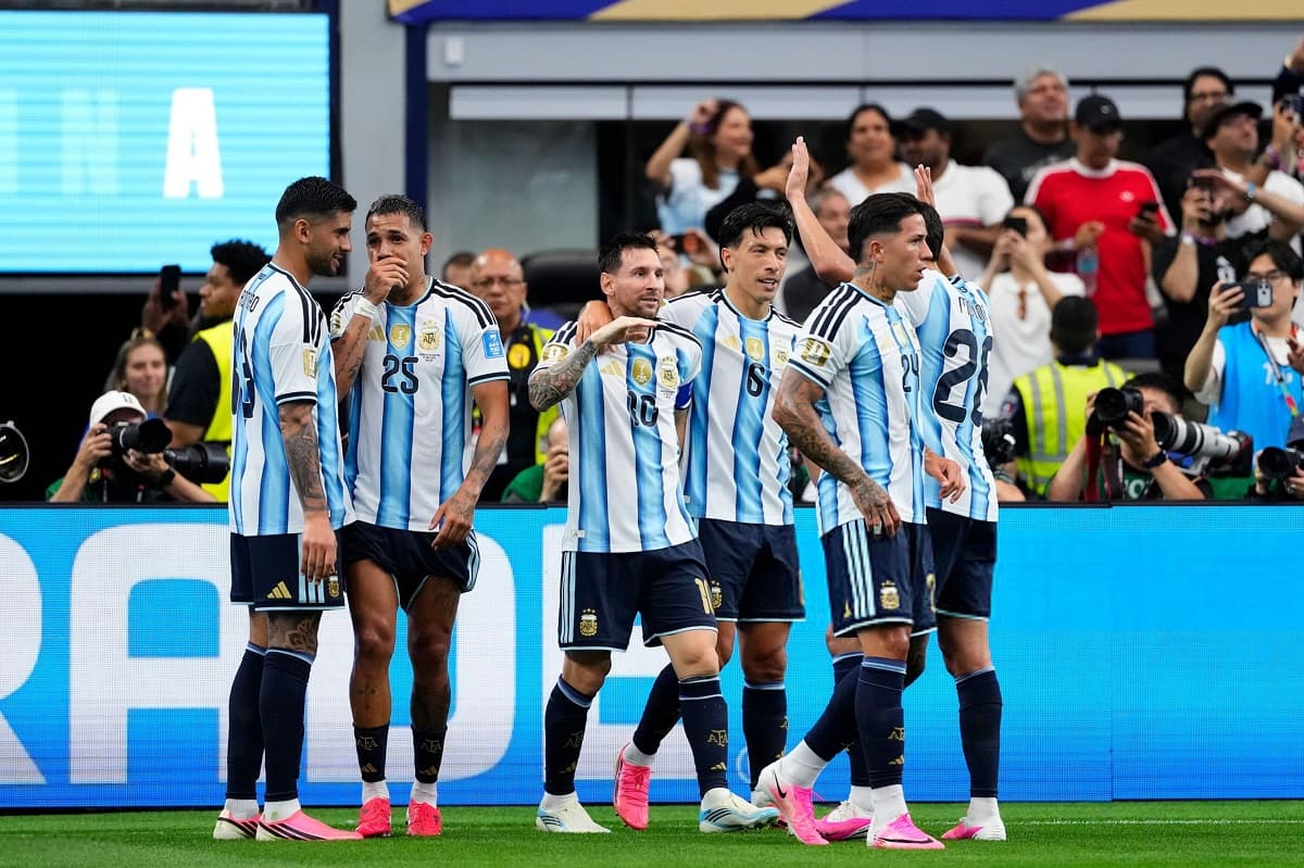 Argentina top Group J after Messi record-breaking brace secures qualification to next round